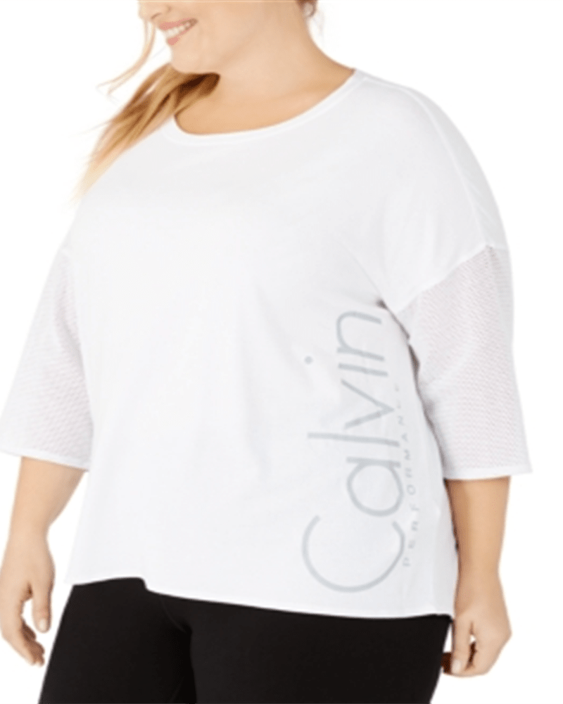 Front of a model wearing a size XL Calvin Klein Women's Plus Dolman Sleeve Logo T-Shirt -White Size XL in White by Calvin Klein. | dia_product_style_image_id:313659